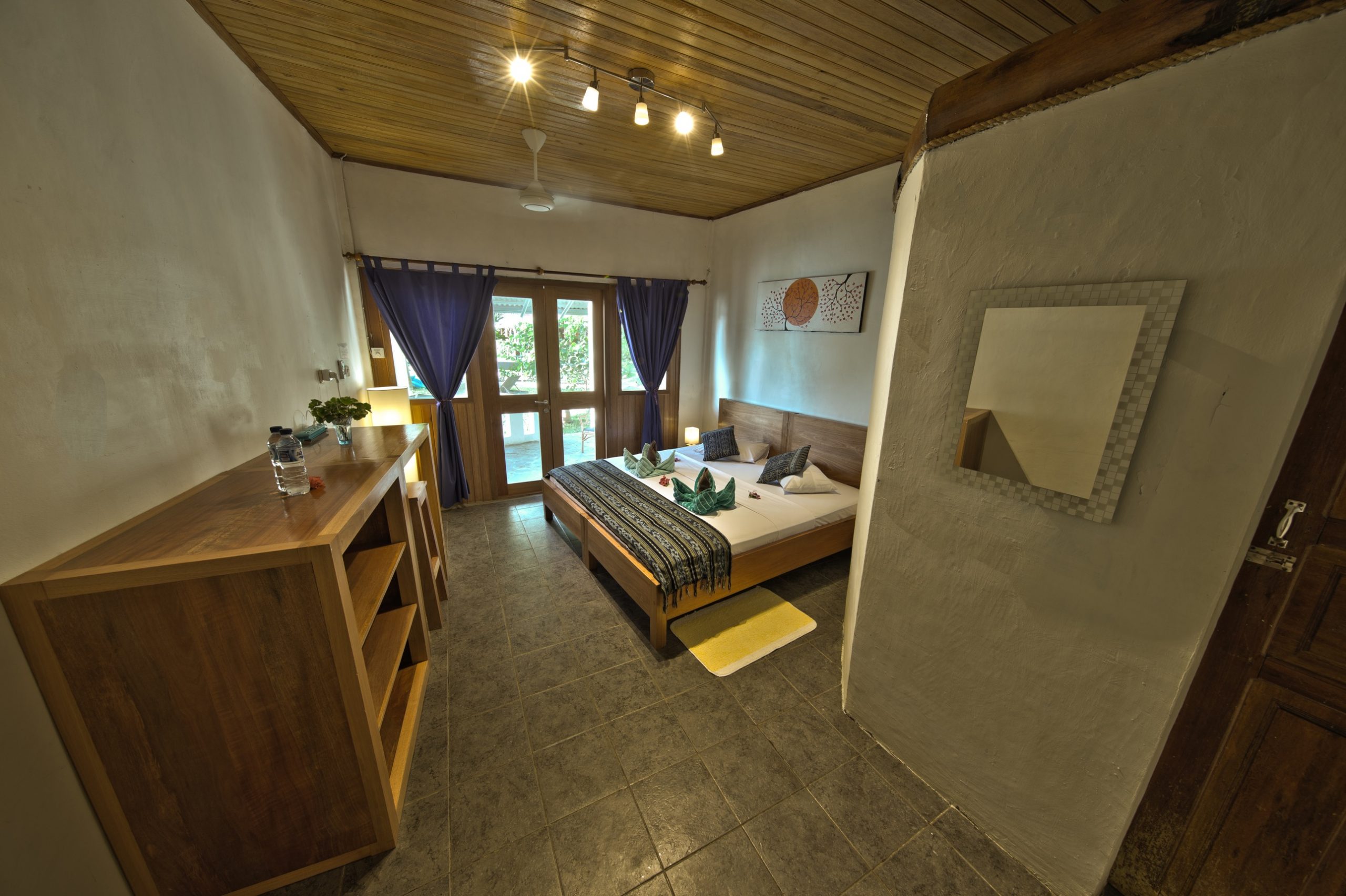 23_NAD-Lembeh_Resort___Beachfront_Room-scaled