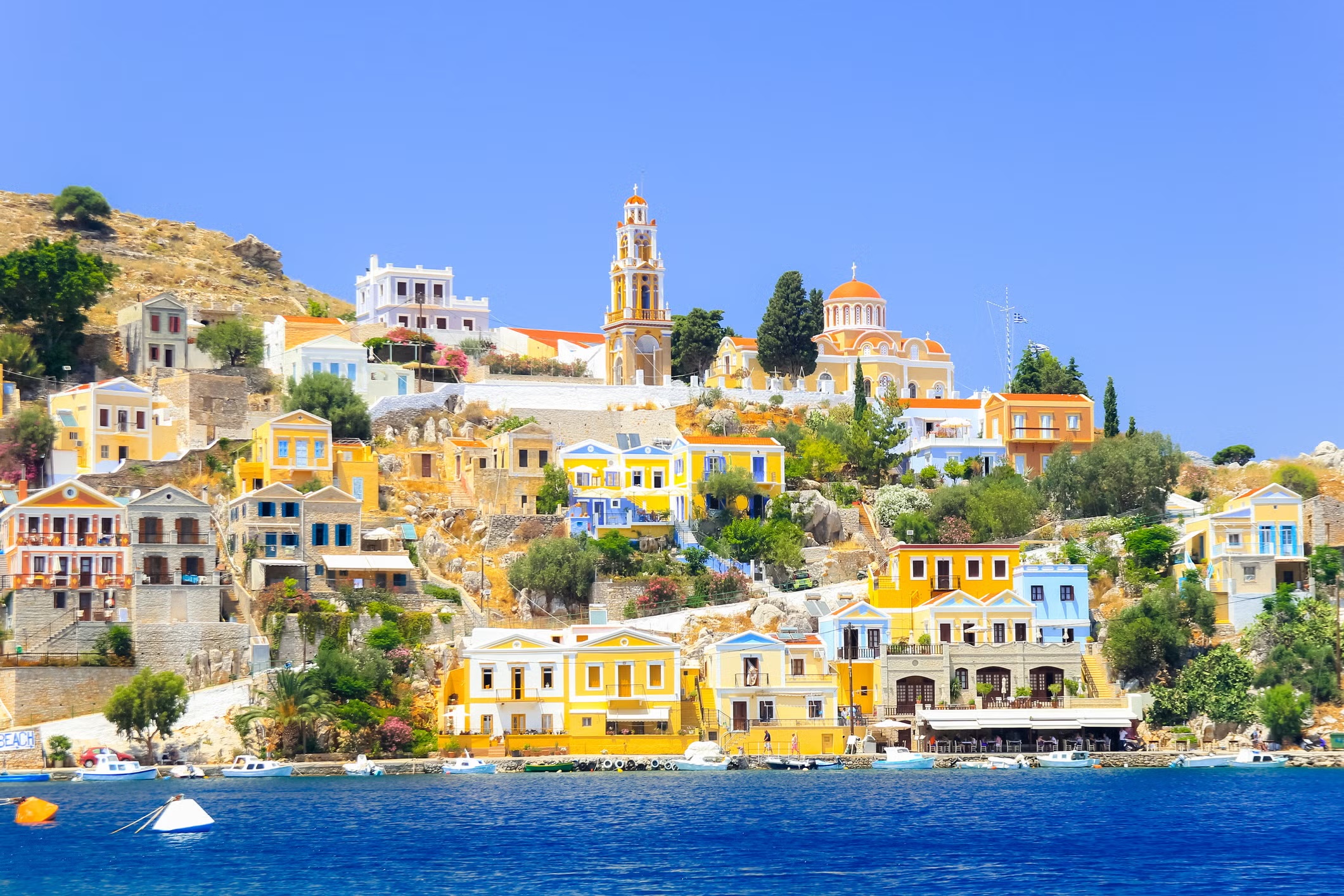 view-over-harbour-to-colourful-houses-and-church-royalty-free-image-1687941243_jpg